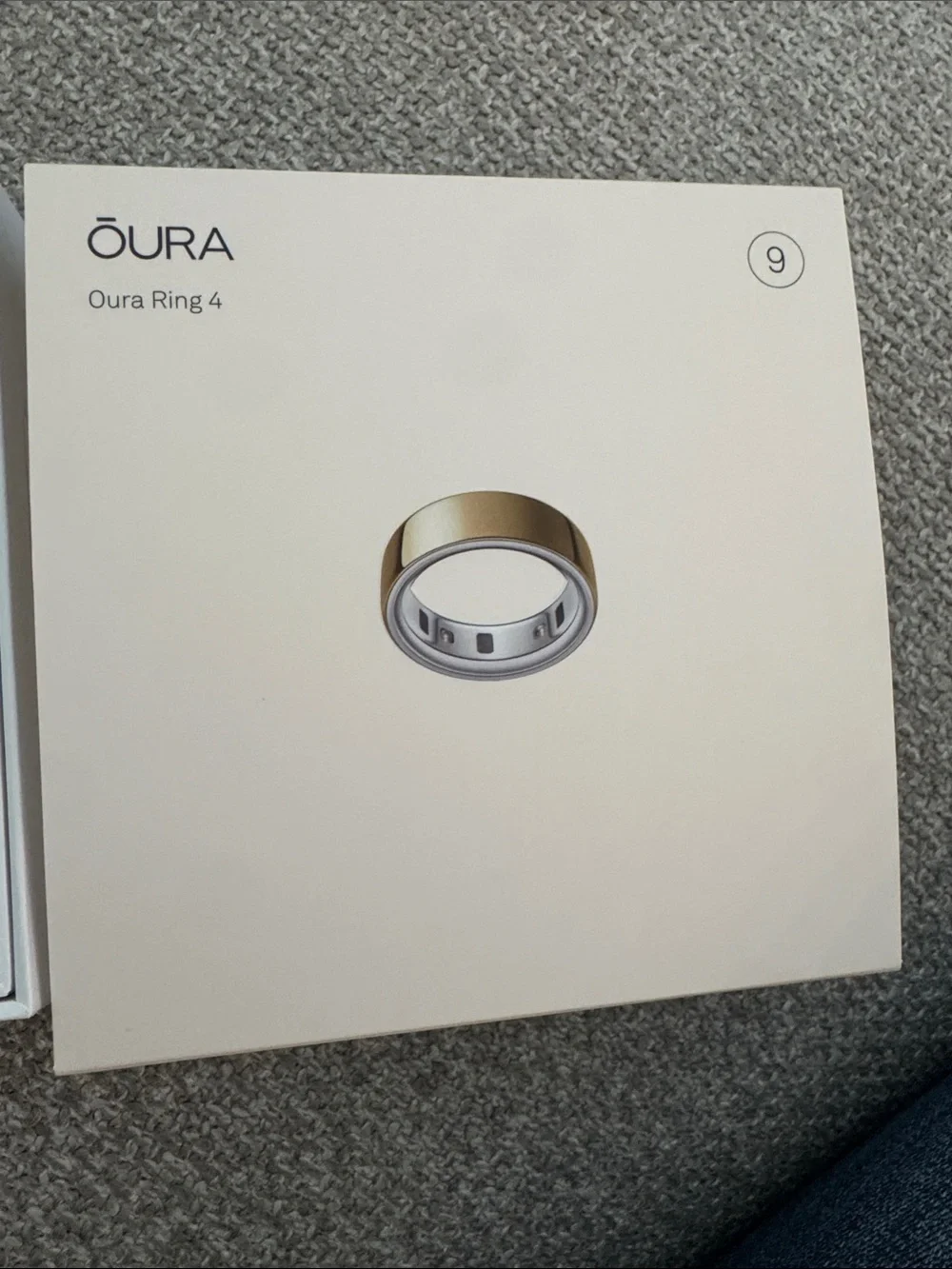 Oura Ring 4 Charging Dock and USB-C Cable in Light Gray